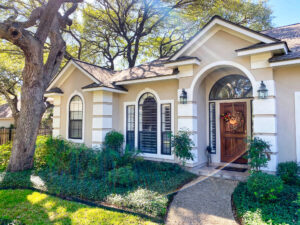 Picture of the front of a recently painted house.
