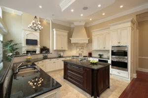 Picture of a beautiful kitchen with recently painted cabinets.