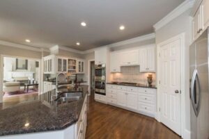 Picture of a kitchen with a recently painted ceiling.